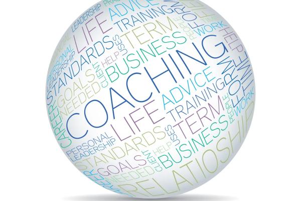 an illustration of a ball with the word "coaching" on it