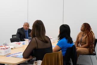 a photograph of Olivia Padilla, Jackeline Almaraz, Tyra Chatman and Dr. Marks Quinton