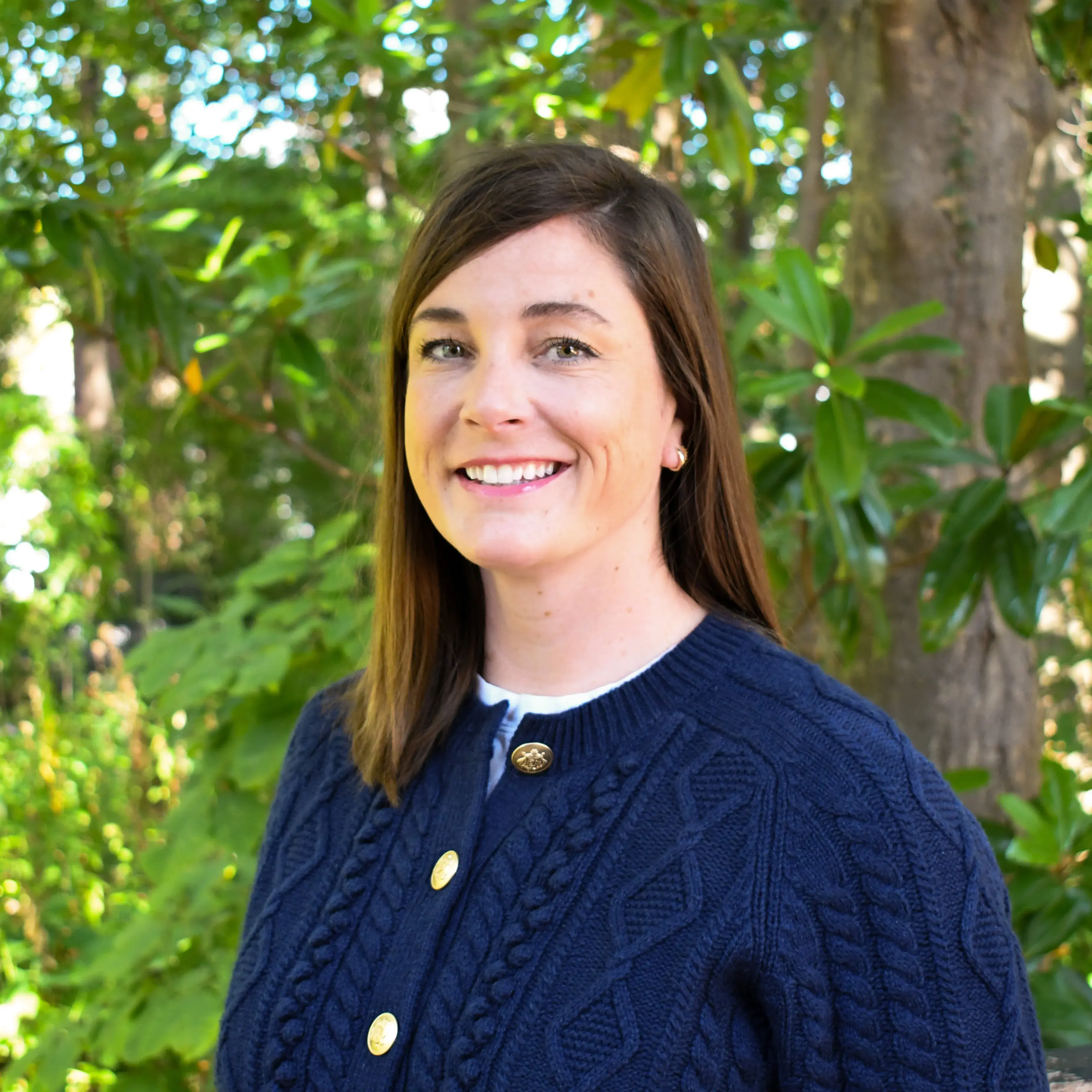 a profile photograph of Emily Clear